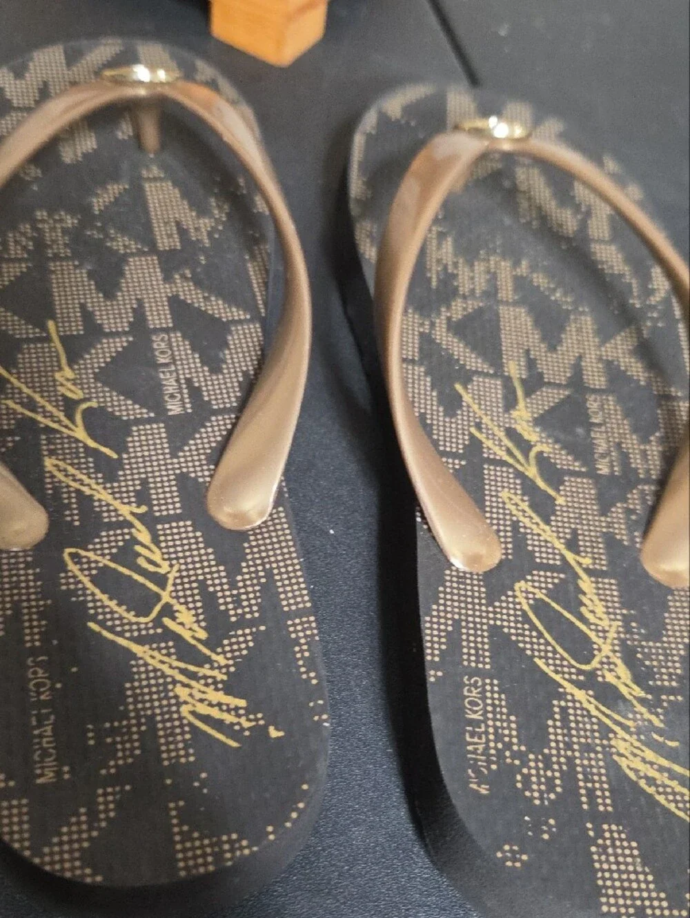 Michael Kors Brown Flip Flop Sandals with Gold MK Medallion